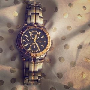 A water resistant steel watch